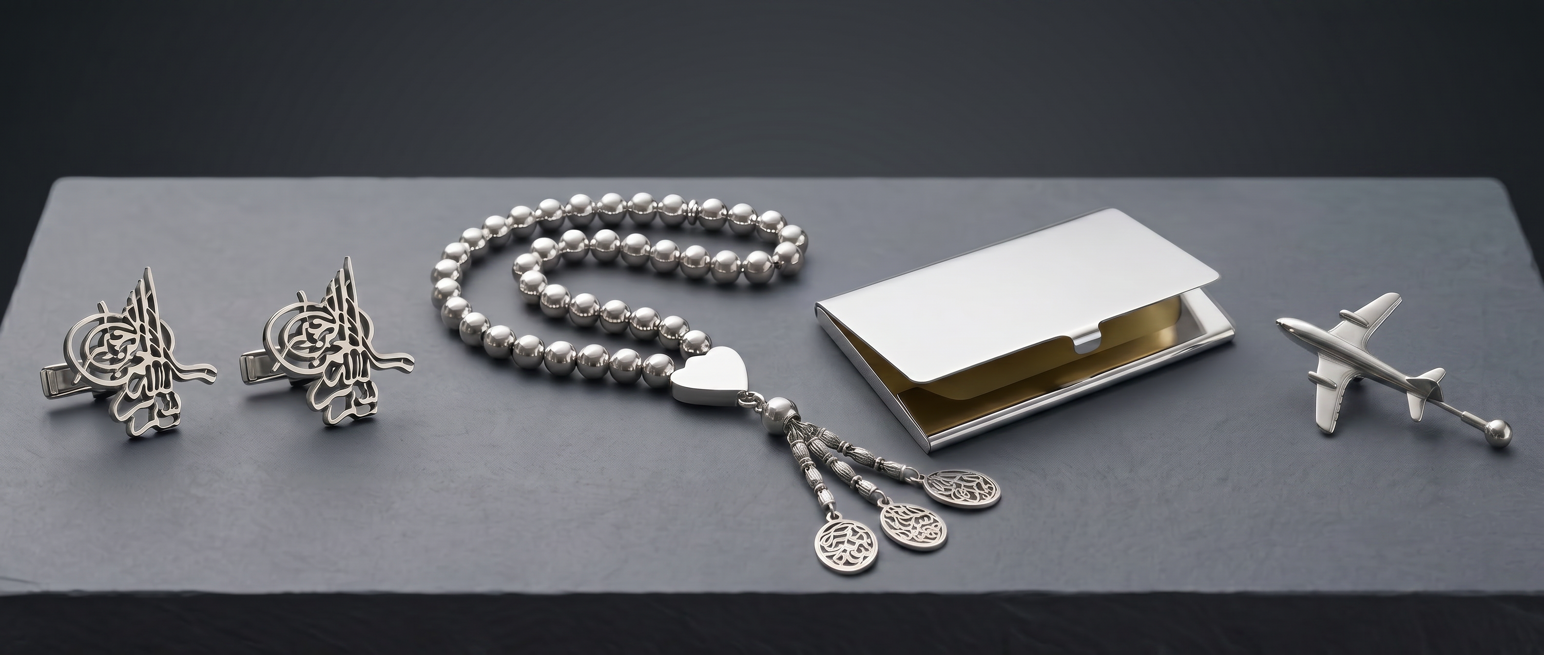 Luxury men’s sterling silver accessories collection featuring handcrafted cufflinks, prayer beads, and elegant gifts by Saad of Egypt.