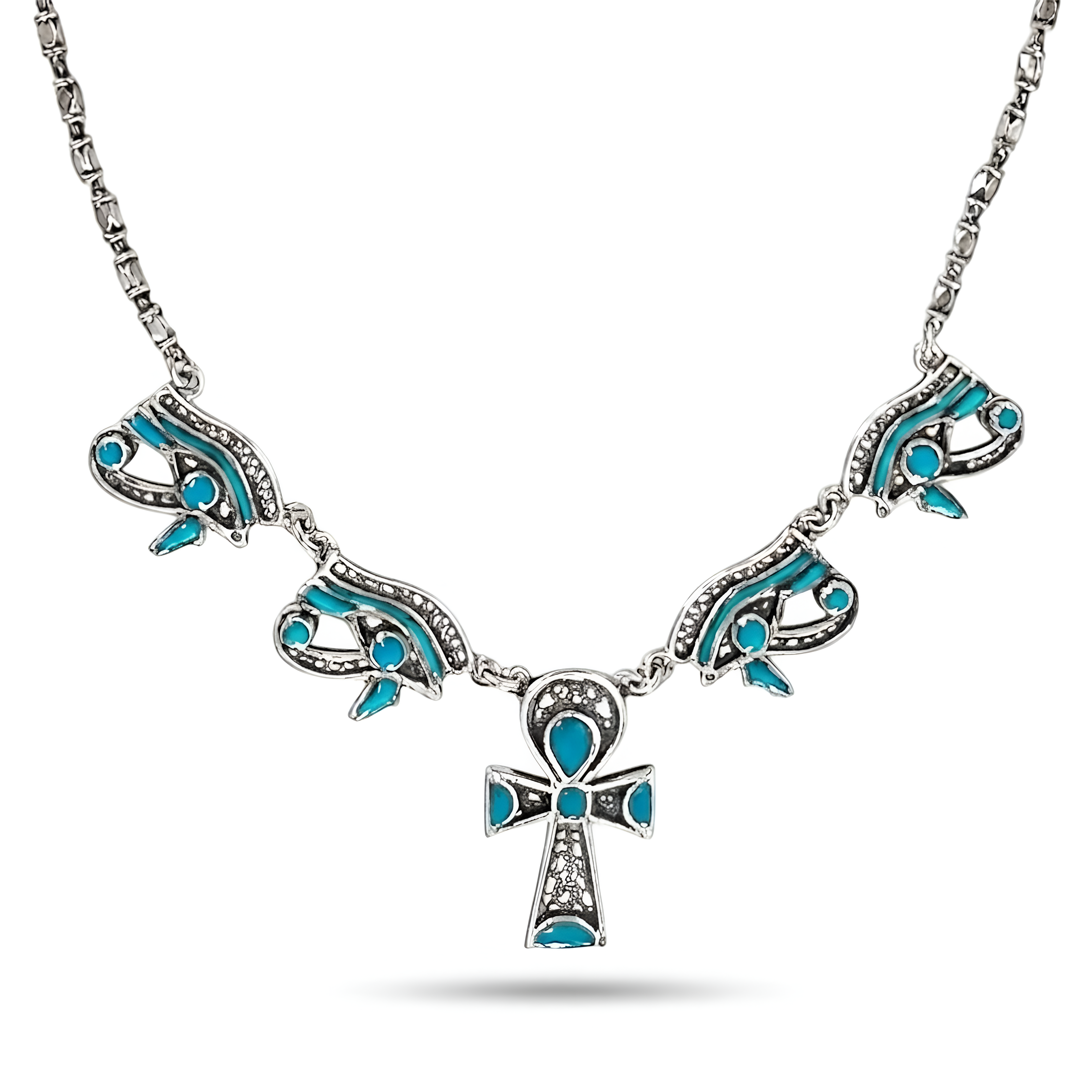 Intricately crafted 925 sterling silver pendant featuring the Eye of Horus and Ankh symbols, highlighted with vibrant turquoise stones, a distinctive jewelry gift for women by Saad of Egypt