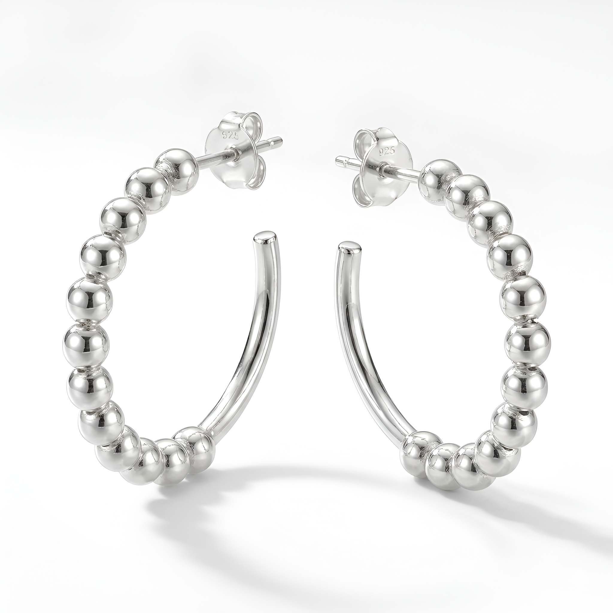 Elegant women 925 sterling silver earrings by Saad of Egypt featuring silver sphere with smooth polish and modern handcrafted artistry. Perfect as a luxury jewelry gift.