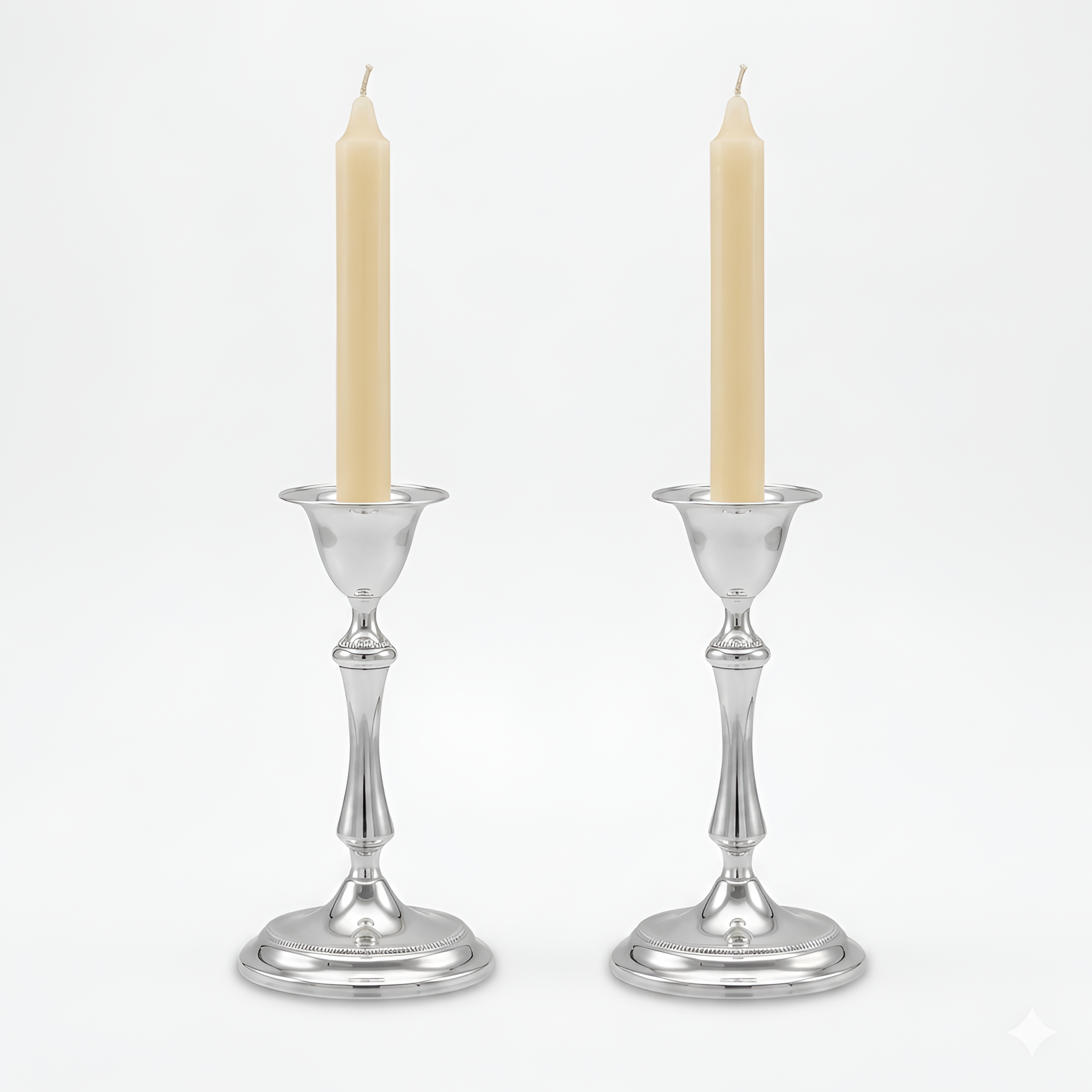
Handcrafted Argent Single Glow candle holders in 900 premium silver displayed with classic candles, highlighting elegant proportions and polished craftsmanship. Refined home décor gift piece by Saad of Egypt.