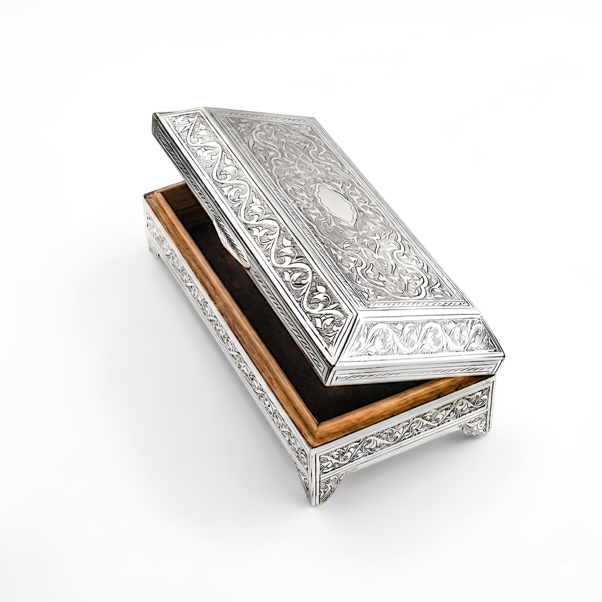 Handcrafted Botanical Keepsake Box in 900 premium silver featuring detailed floral engravings and an elegant interior storage compartment. Luxurious handcrafted décor piece designed with timeless sophistication by Saad of Egypt.