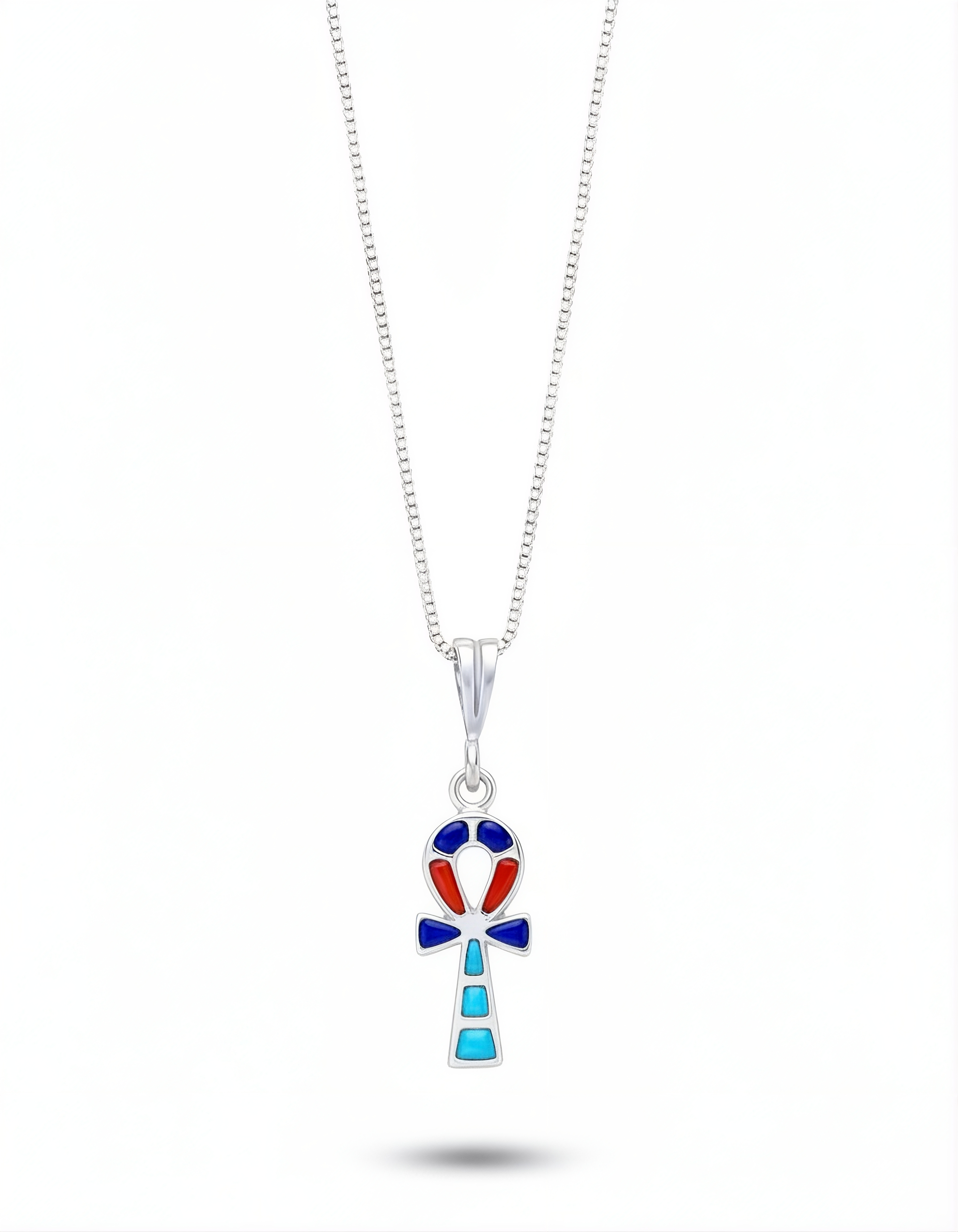 Double-sided ankh pendant in 925 sterling silver featuring hand-set coral, lapis lazuli, and turquoise. Handcrafted Egyptian women's gift by Saad of Egypt