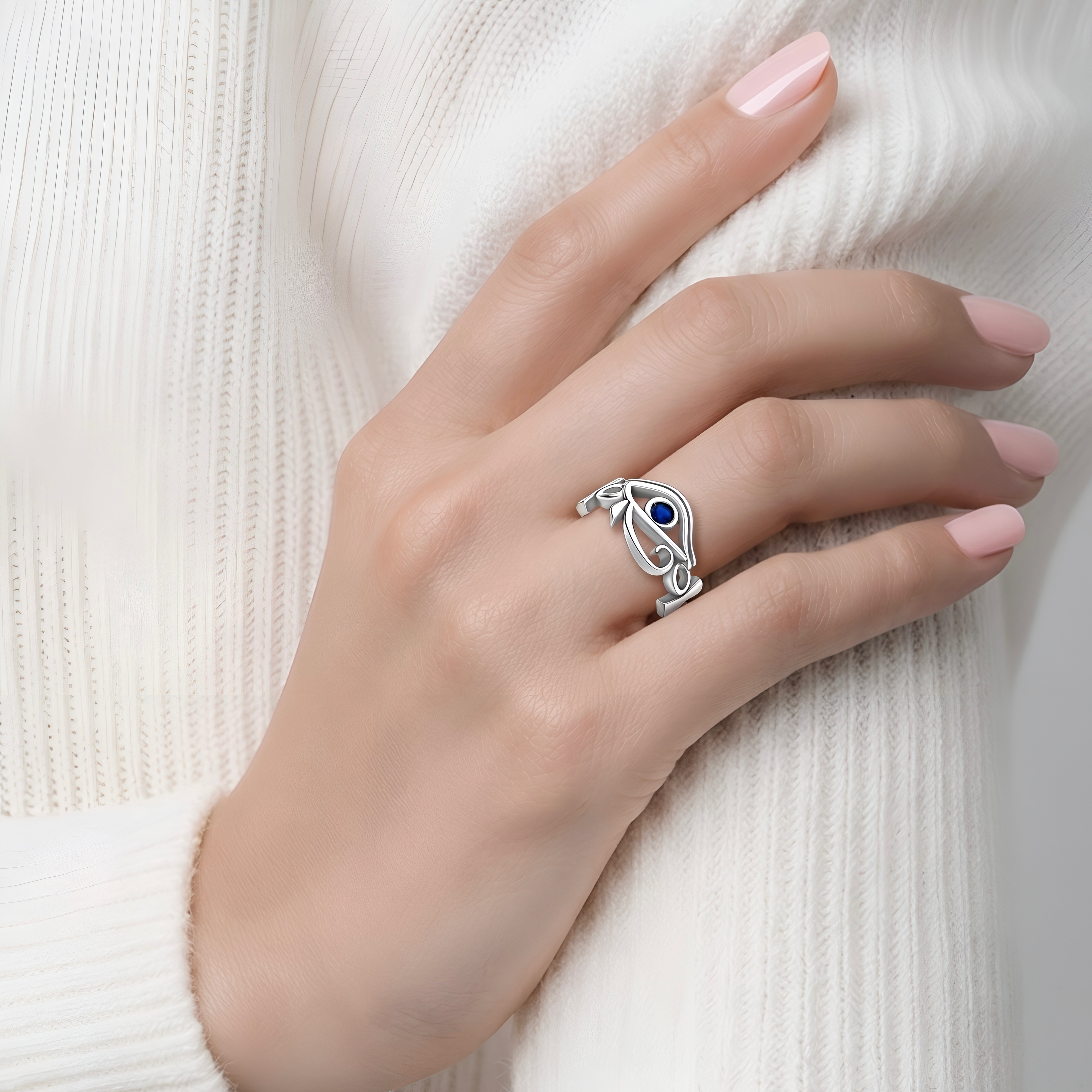 Handcrafted Eye of Horus and Ankh ring in 925 sterling silver featuring an elegant symbolic design with a deep blue accent stone. Refined women’s jewelry and meaningful gift piece showcasing timeless Egyptian-inspired craftsmanship by Saad of Egypt.