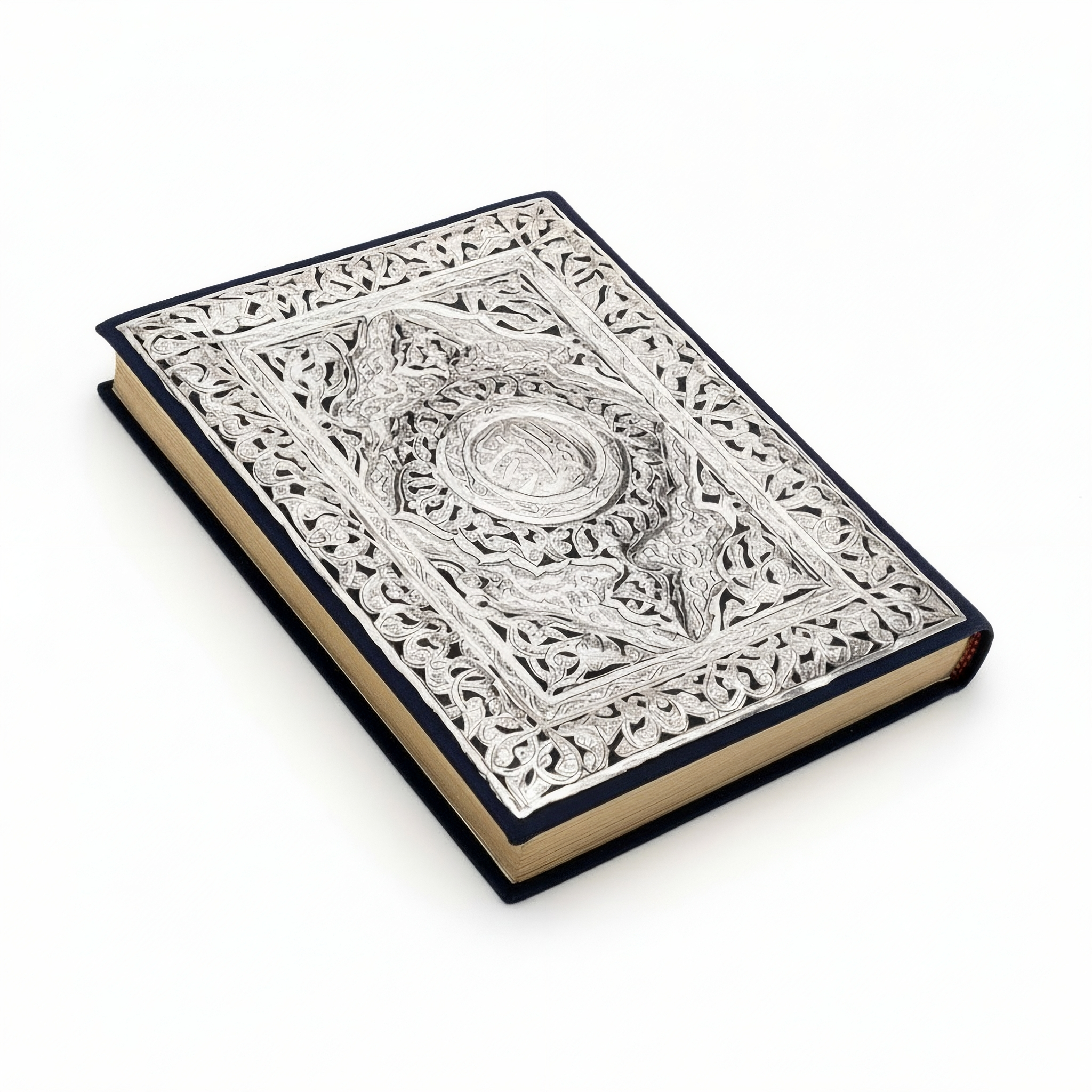 Close-up of handcrafted 900 premium silver Quran cover showing delicate Islamic cutout patterns, spiritual heirloom gift by Saad of Egypt