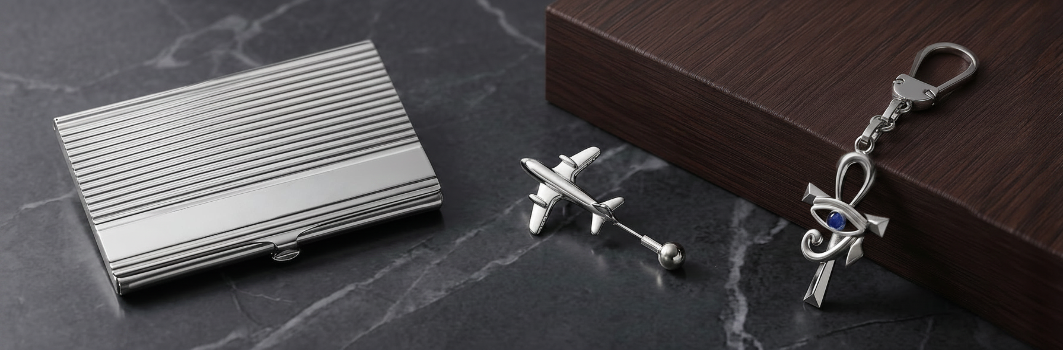 Handcrafted men’s 925 sterling silver accessories including keychains, card holders, and aviation-inspired pieces perfect for gifting by Saad of Egypt.