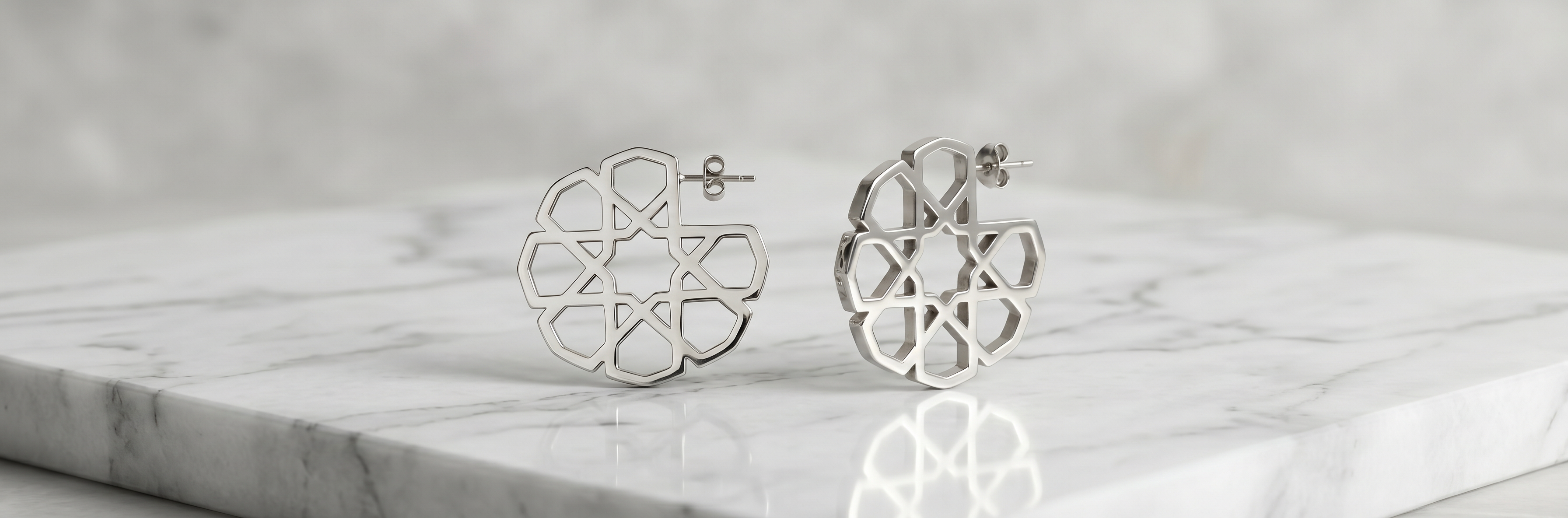 Elegant women 925 sterling silver earrings by Saad of Egypt featuring modern handcrafted artistry and timeless luxury jewelry styling.
