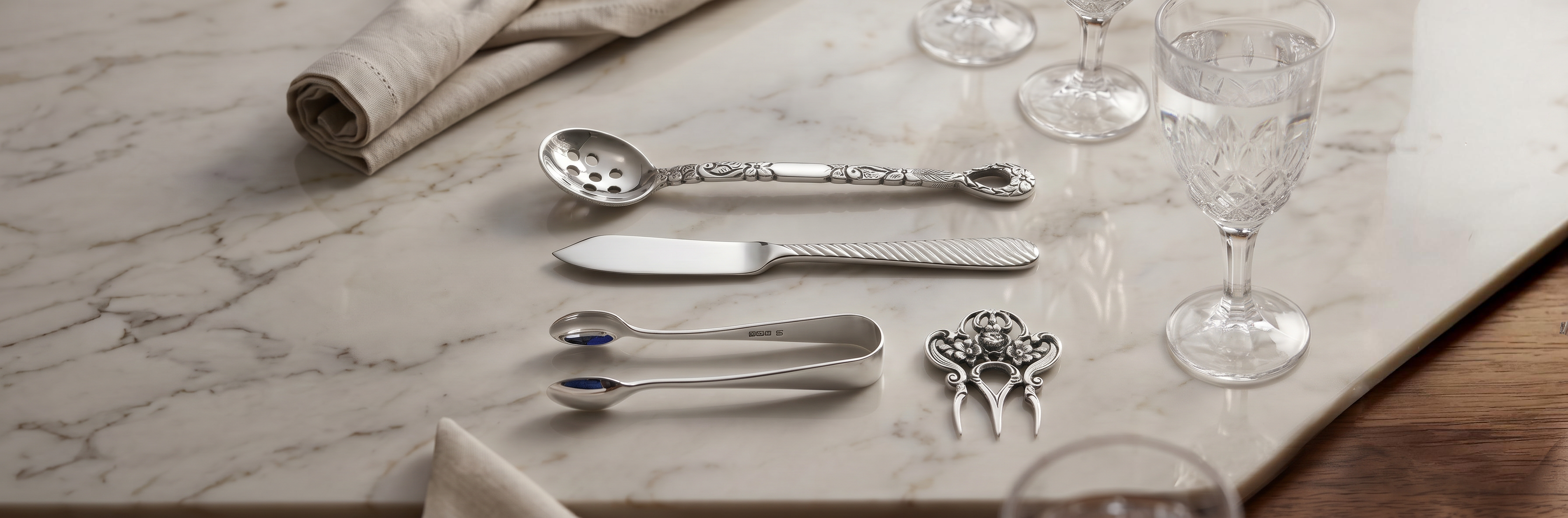 Handcrafted premium sterling silver tableware and serving accessories by Saad of Egypt designed to elevate luxury dining and elegant home gatherings.