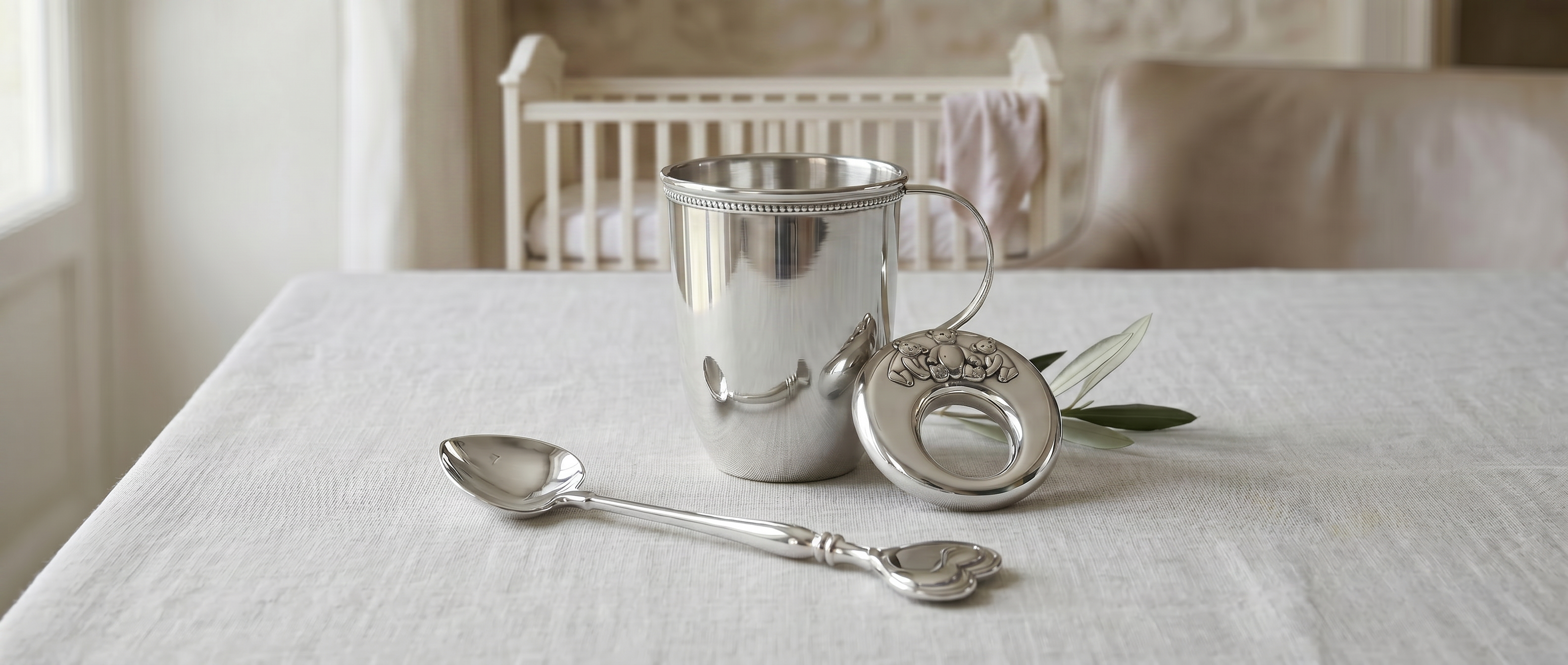 Luxury sterling silver baby gifts including a handcrafted baby cup, spoon, and decorative baby frame, and more for gifting by Saad of Egypt.