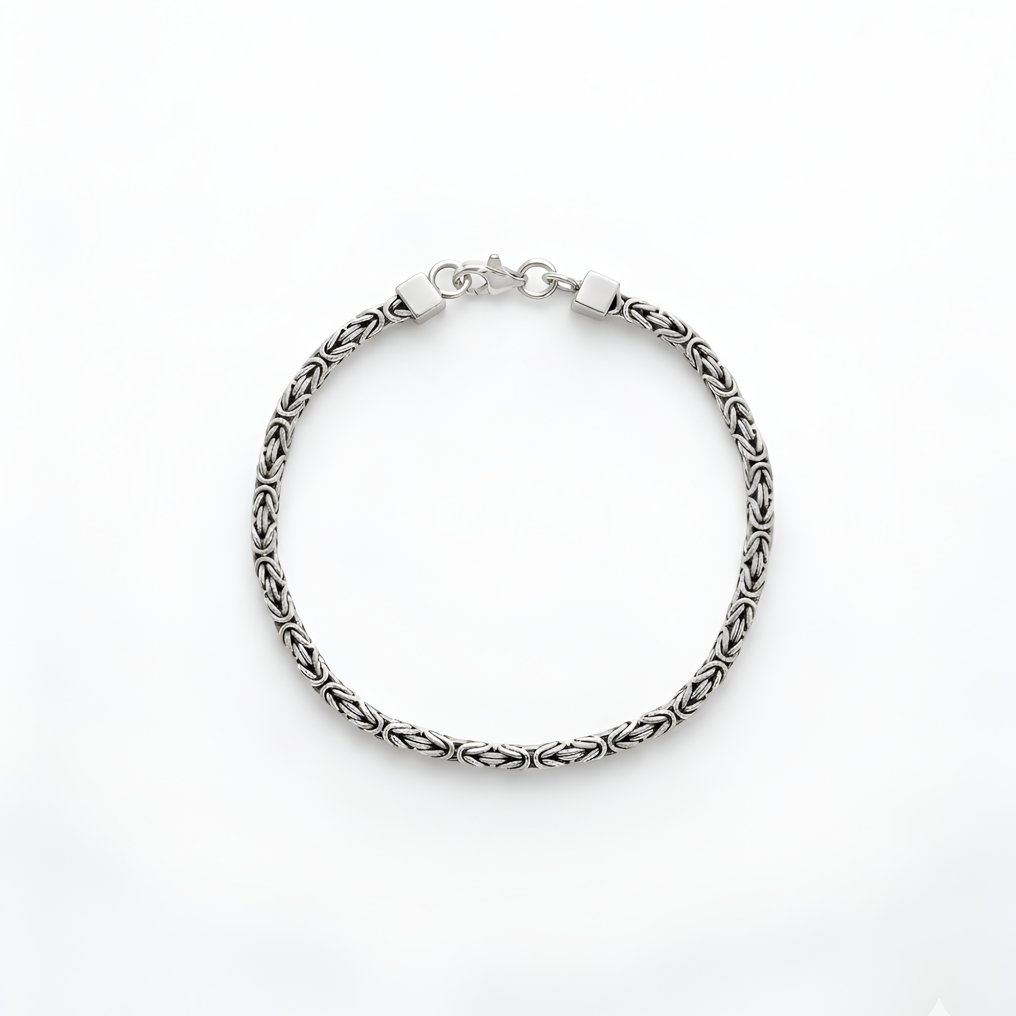 Elegant handcrafted 925 sterling silver Emperor chain bracelet featuring intricate Byzantine-inspired link detailing with a polished premium finish, designed for refined masculine elegance, statement styling, and luxury silver gift collections by Saad of Egypt.