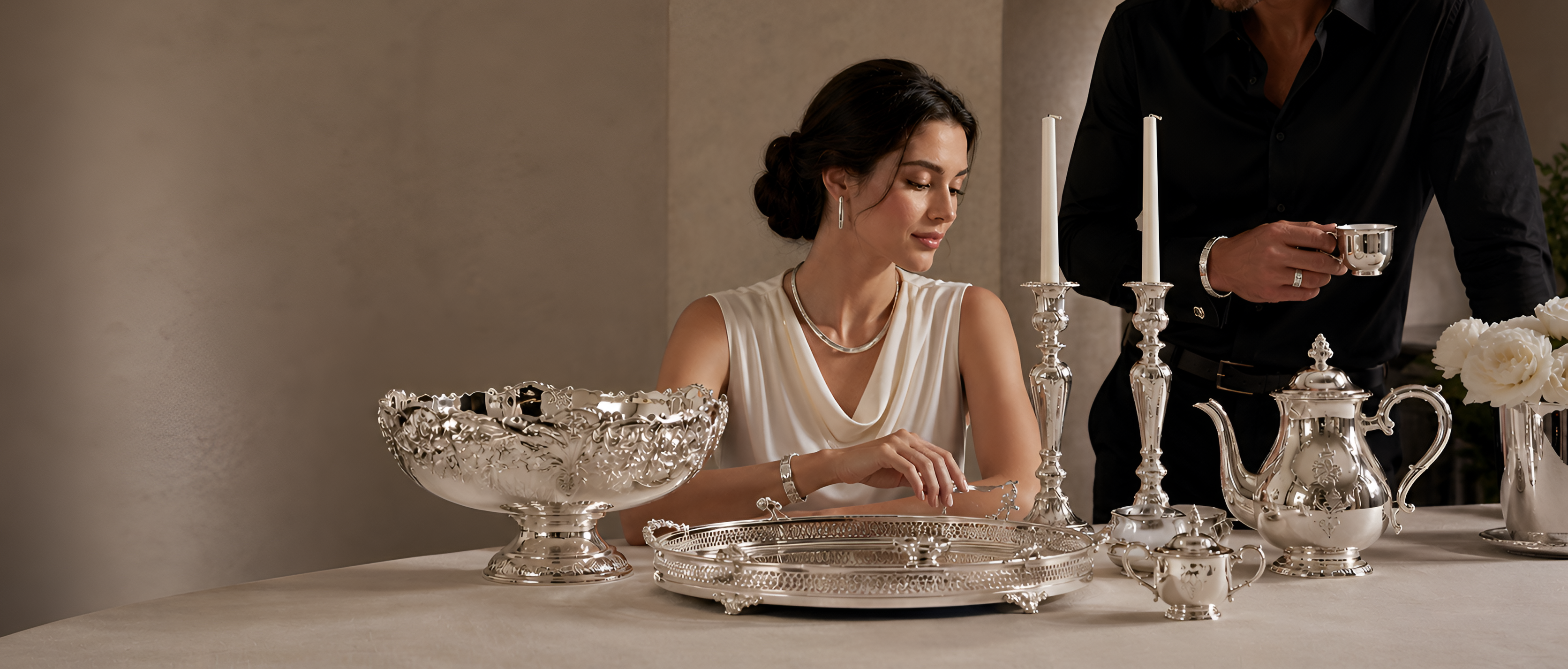 Elegant lifestyle banner featuring handcrafted sterling silver home décor, serving pieces, and jewelry styled in a refined luxury setting showcasing timeless craftsmanship and sophisticated gifting by Saad of Egypt.
